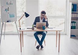 Image result for Person Sitting at a Desk