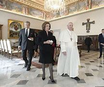 Image result for Nancy Pelosi with Pope Hat