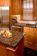 Image result for Dark Brown Granite Countertops Kitchen
