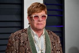 Image result for Elton John Broken Face