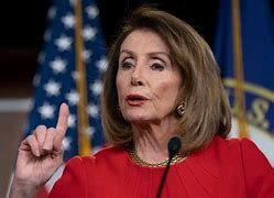 Image result for Pelosi in African Robes