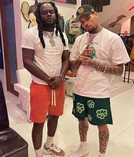 Image result for Chris Brown Wearing Camo Shirt Durag
