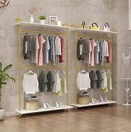 Image result for Hanging Clothes Rack with Shelves Retail Space