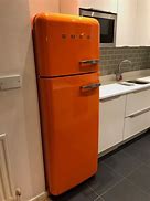 Image result for orange smeg refrigerator