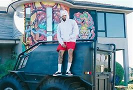 Image result for Chris Brown Yeezys