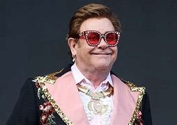 Image result for Elton John Dressed as Queen