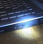 Image result for Open CD Tray From HP ProBook