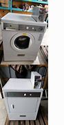 Image result for Washer Dryer Coin Operated Mounted