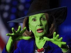 Image result for Nancy Pelosi Blue Dress and Mask