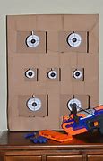 Image result for What to Cut Out of a Box for a Kids Nerf War