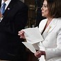 Image result for Pelosi at Trump State of the Union