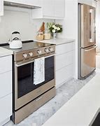 Image result for Kitchens with Sunset Bronze Appliances