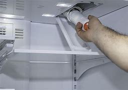 Image result for Frigidaire Refrigerator Leaking Underneath