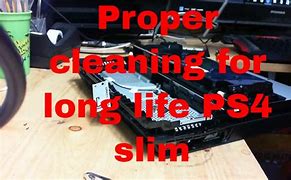 Image result for Opening a PS4 Slim for Cleaning