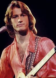 Image result for Andy Gibb with Daughter as a Baby