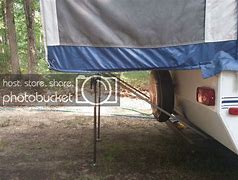 Image result for Coleman Camp Wagon Supports Up To 150 Lbs Holds Up To 5 Cu Ft Teles...