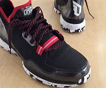Image result for Damian Lillard Shoes Black and Yellow