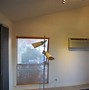 Image result for Space-Saving Behind Door Clothes Hanger