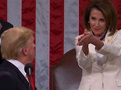 Image result for Nancy Pelosi Pink Suit