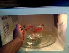 Image result for Vinegar Holder to Clean Microwave