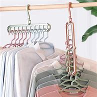 Image result for Skirt and Blouse On Hanger