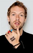 Image result for Chris Martin Tattoo