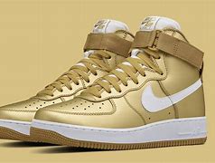 Image result for Black and Gold Nike Shoes