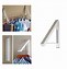 Image result for Wall Mounted Retractable Clothes Hanger Rack