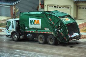 Image result for photo of a garbage truck
