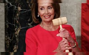 Image result for Nancy Pelosi Yellow Dress Press Conference