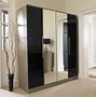 Image result for Space-Saving Wardrod