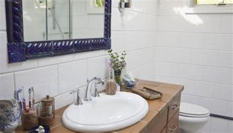 How to Hang a Mirror on Ceramic Tile   HomeSteady