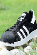 Image result for Tan and Black Adidas Shoes