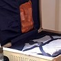 Image result for How to Hang Shirts