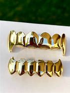 Image result for Cap Fang Grillz
