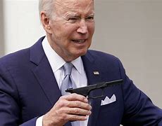 Image result for Joe Biden with Gun