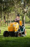 Image result for Kid Mowing Lawn