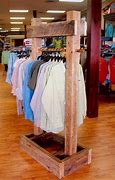 Image result for rustic wood clothing racks