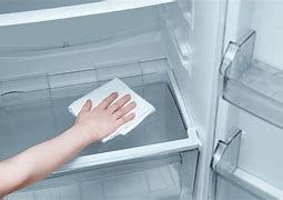Image result for Remove Refrigerator Drip Pan Whirlpool