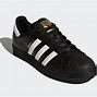 Image result for Adidas Black and White and Gold Fotoball Shoes