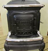 Image result for Antique Parlor Stoves for Sale