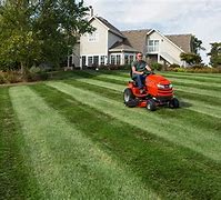 Image result for Commercial Lawn Mower Cutting Grass