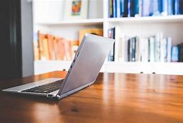 Image result for Laptop On Table