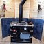 Image result for Cast Iron Wood-Burning Parlor Stove