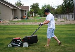 Image result for Mowing Machine