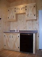 Image result for Barn Door Kitchen Cabinets