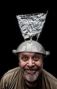 Image result for Wearing a Tin Foil Hat and Face Mask