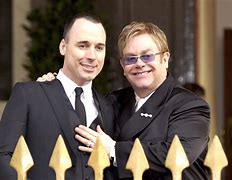 Image result for David Furnish Elton John 90s