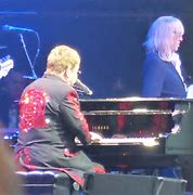 Image result for Elton John Singing