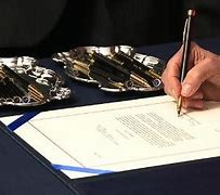 Image result for Nancy Pelosi Pen Signing